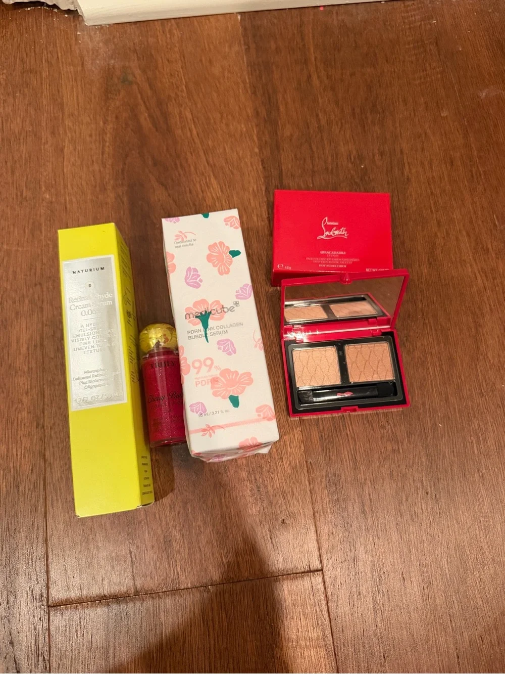 Christian Louboutin compact, medicine, truly, naturium